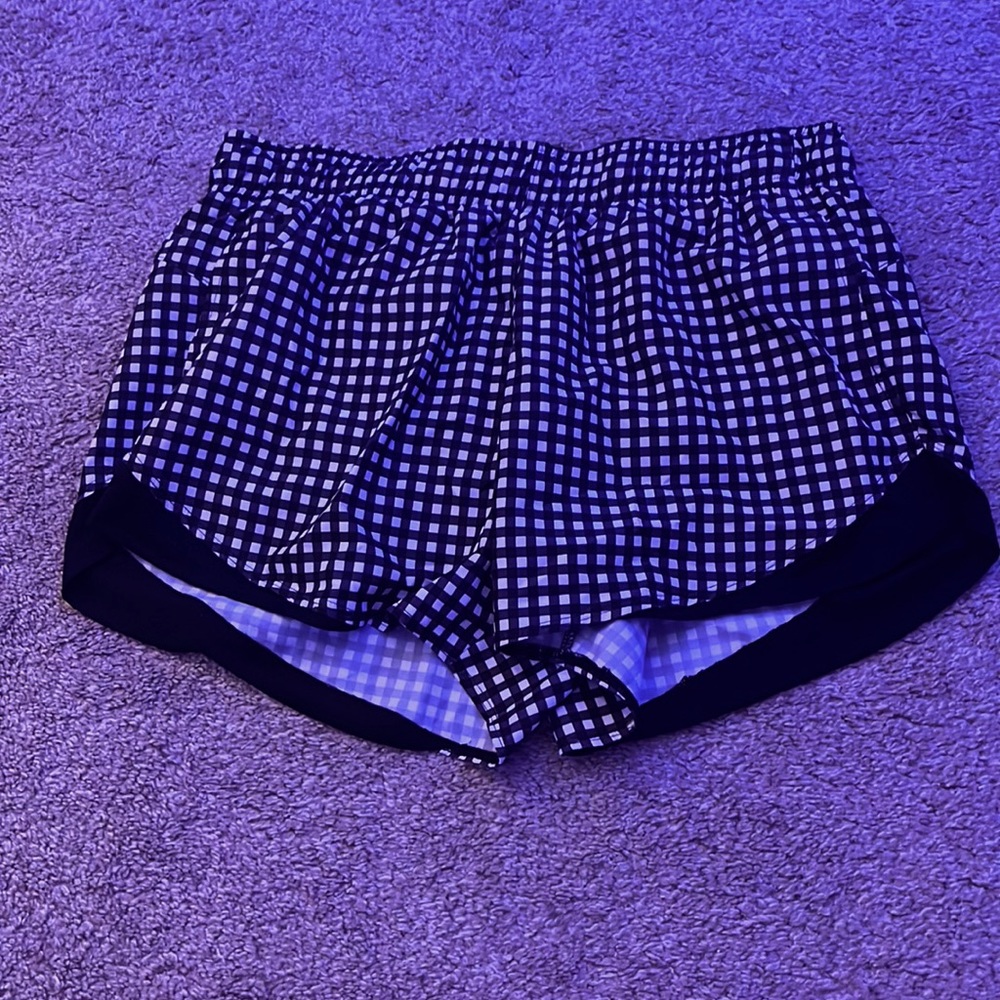 Black and white athletic shorts, size L